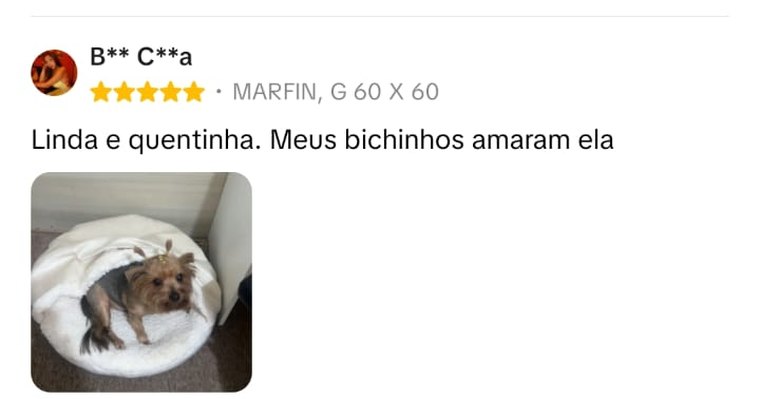 Avaliação cinco estrelas: linda e quentinha, meus bichinhos amaram ela. Com foto do cachorro dentro da cama iglu.